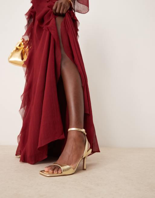 ASOS DESIGN Hollow barely there heeled sandals in gold