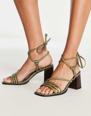 ASOS DESIGN HOLLOW STRAPPY TIE LEG MID HEELED SANDALS IN GREEN