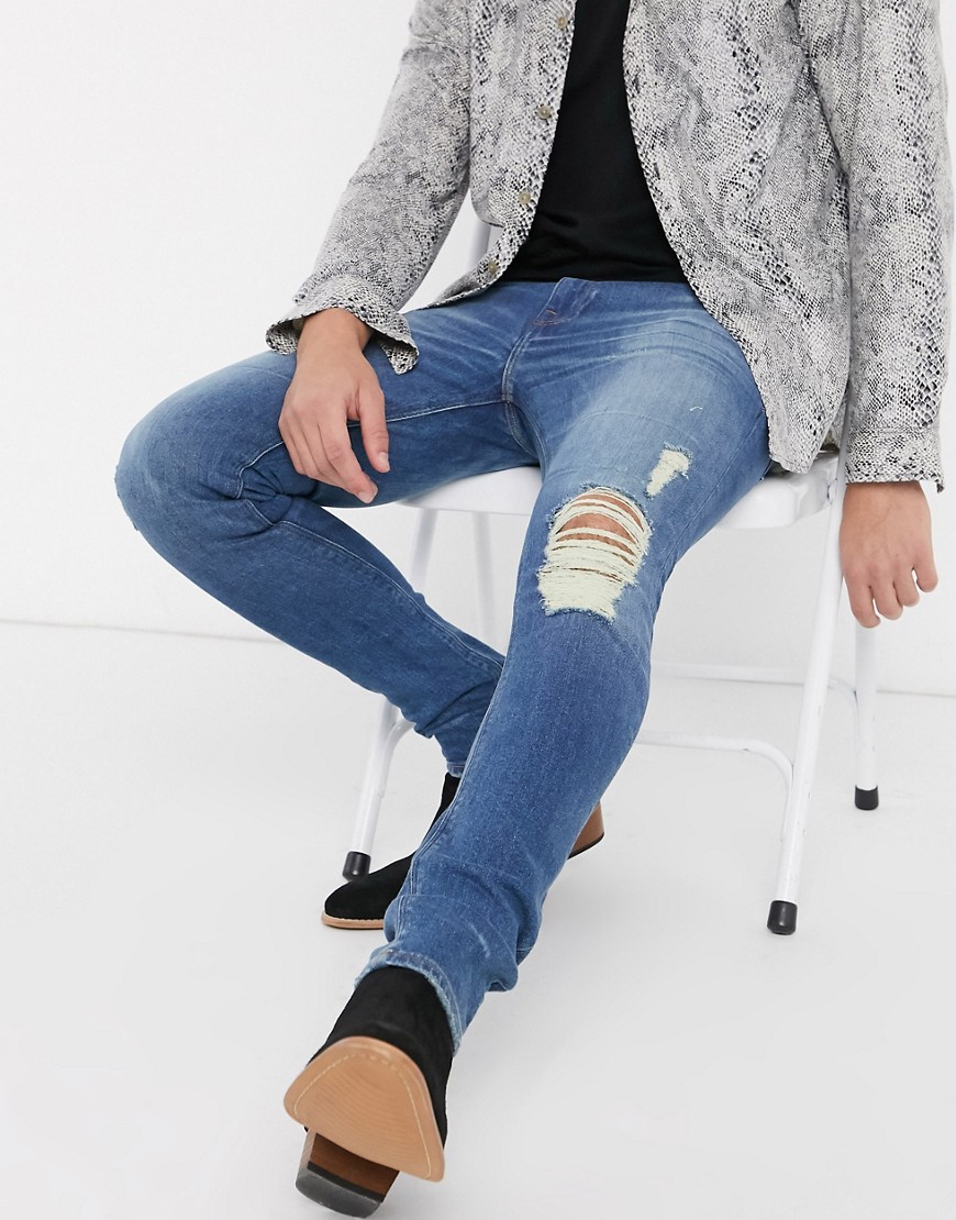 ASOS DESIGN – Honestly worn – Mellanblå superskinny jeans i vintagestil med knärevor