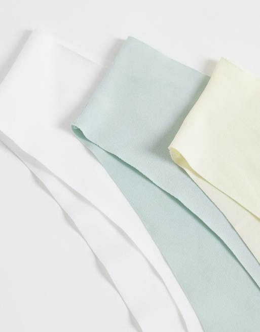 ASOS DESIGN – Honey – 3er-Pack nicht sichtbare brasilianische Slips in Salbeigrün, Buttermilchgelb und Weiß, 2 von 3