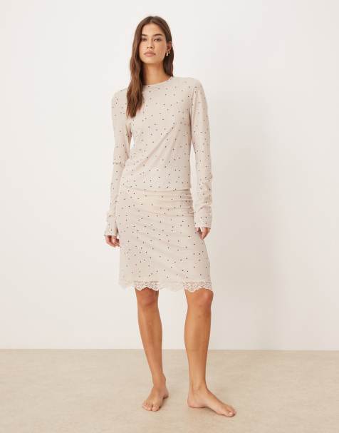 ASOS DESIGN Honey slinky polka dot midi skirt with lace trim in cream