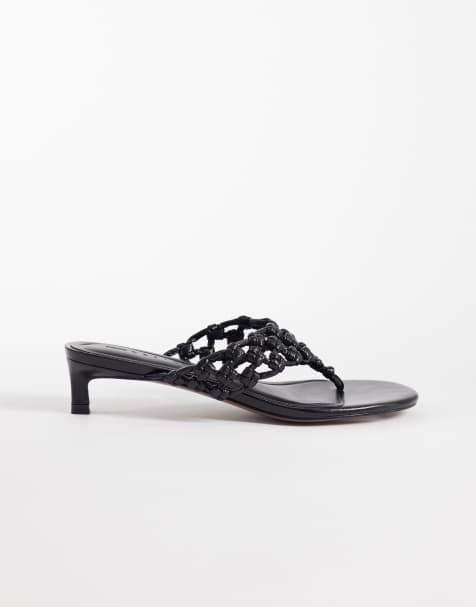 ASOS DESIGN – Honeybun – Zehenstegsandaletten in Schwarz mit verknotetem Webdesign und Kitten-Absatz - view 1