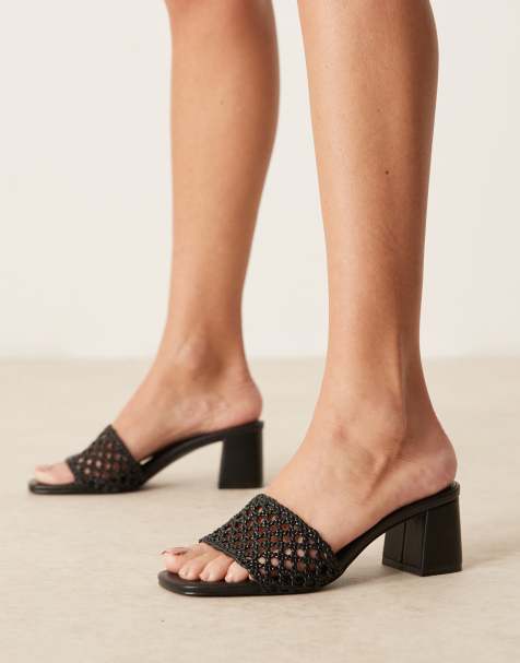 ASOS DESIGN Honeycomb weave detail mid heeled mules in black - view 1