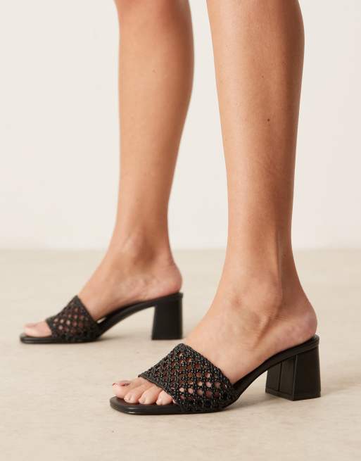 ASOS DESIGN Honeycomb weave detail mid heeled mules in black