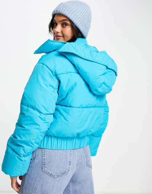 Bright blue store puffer jacket