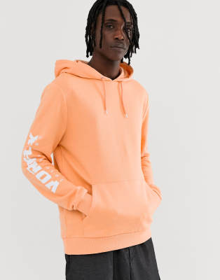 light orange sweatshirt