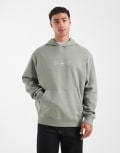 [ASOS DESIGN] ASOS DESIGN hoodie with celestial print in light green M Sea spray