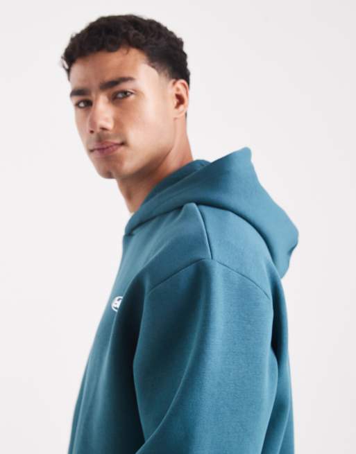 ASOS DESIGN hoodie with metallic sports print in teal blue, 4 of 5