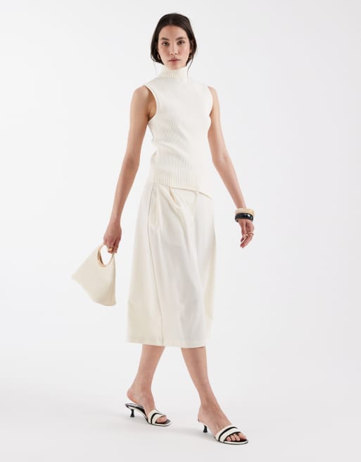 ASOS DESIGN - Hoogsluitende fijngebreide top met asymmetrische zoom in crème, 2 van 4