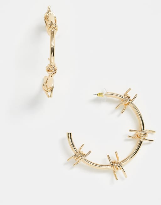 ASOS DESIGN hoop earrings in barbed wire design in gold tone