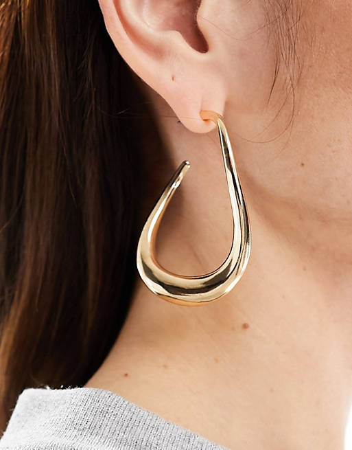 ASOS DESIGN hoop earrings with abstract twist design in gold tone | ASOS