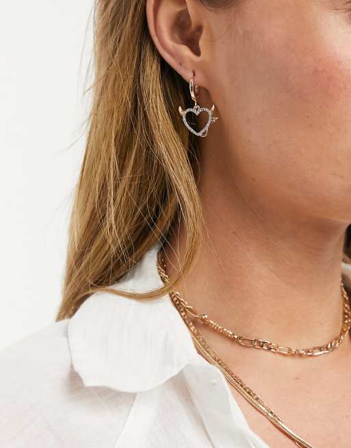 ASOS DESIGN hoop earrings with angel and devil heart charms in