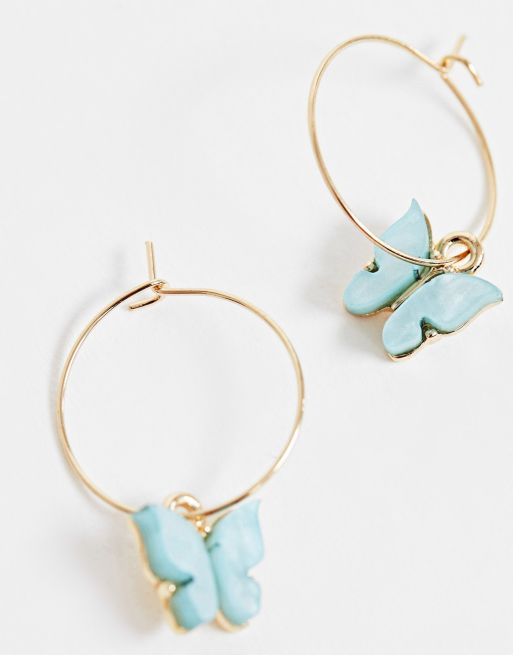 ASOS DESIGN hoop earrings with blue butterfly charm in gold tone, 2 of 4
