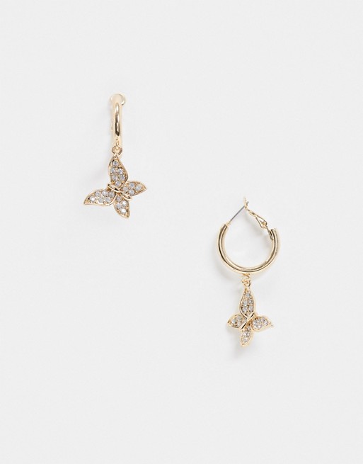 ASOS DESIGN hoop earrings with crystal butterfly charm in gold tone