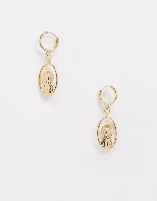 ASOS DESIGN hoop earrings with cut out religious icon charm in gold tone