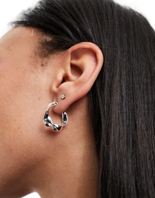 ASOS DESIGN hoop earrings with flat twist design in silver tone