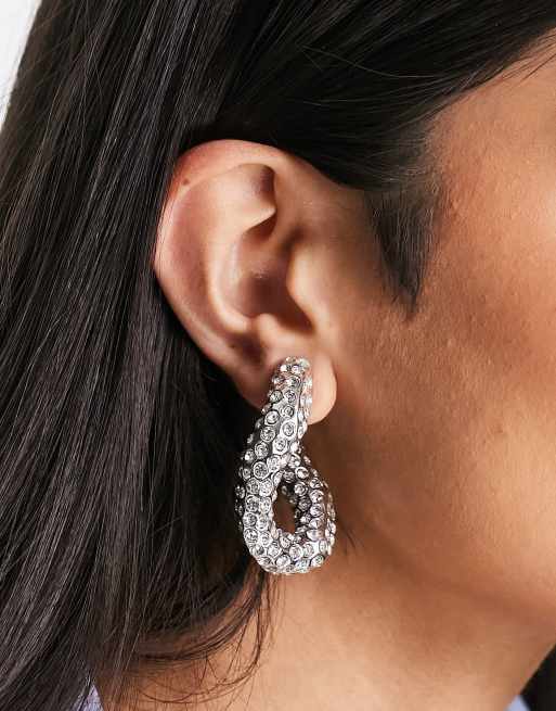 ASOS DESIGN hoop earrings with large twist link crystal drench design in silver tone