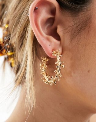ASOS DESIGN hoop earrings with natural leaf design in gold tone