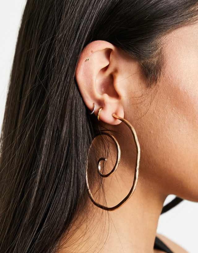 ASOS DESIGN hoop earrings with oversized swirl design in gold tone