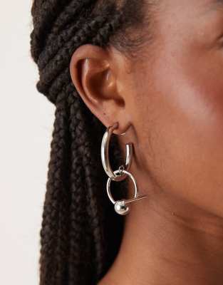 hoop earrings with spherical abstract design in silver tone