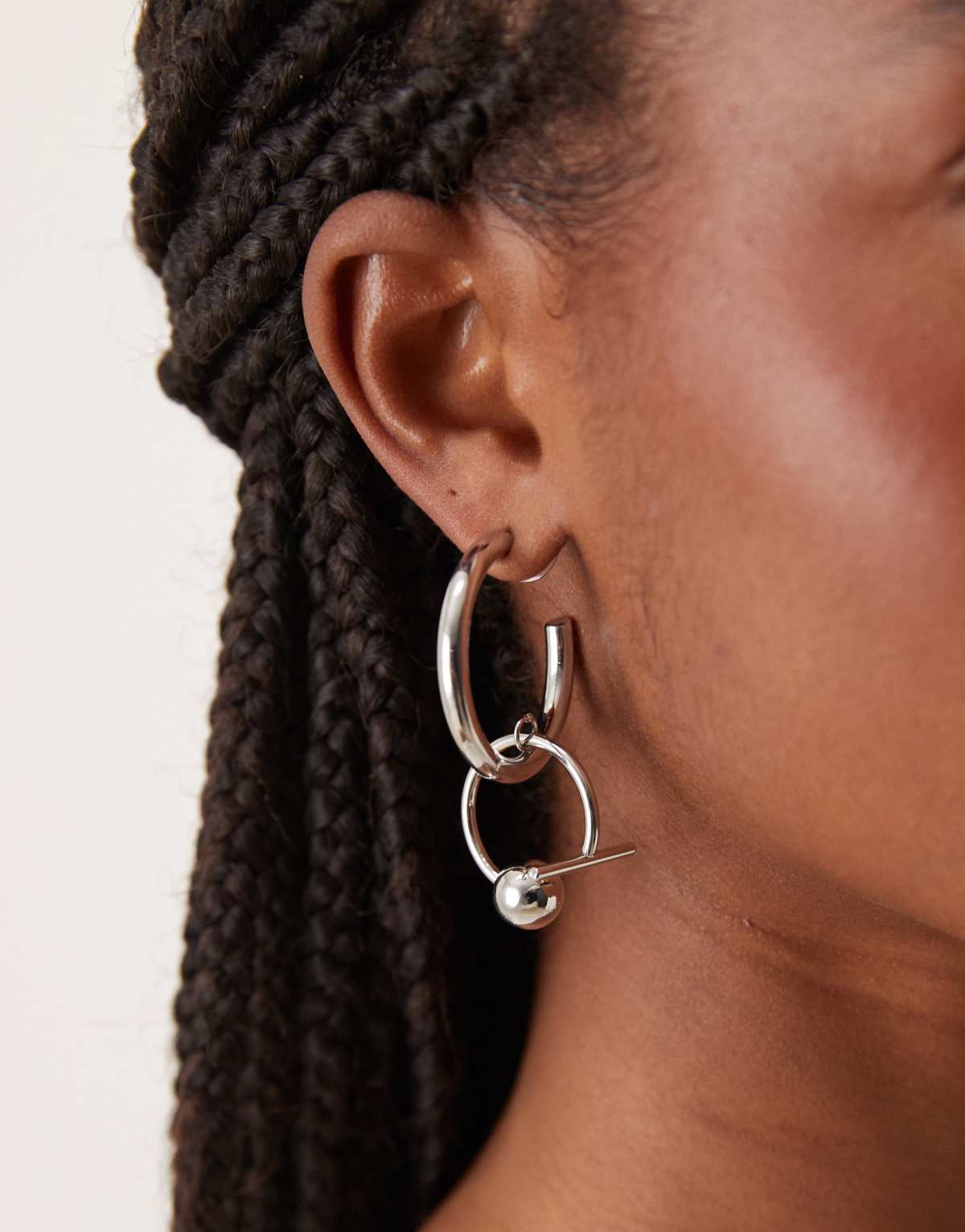 ASOS DESIGN hoop earrings with spherical abstract design in silver tone