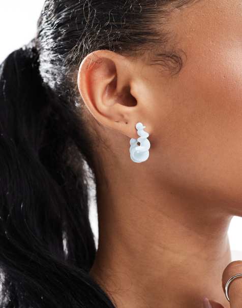 ASOS DESIGN hoop earrings with twisted clicker detail in blue - view 1