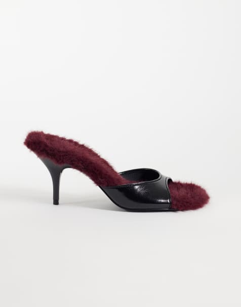 ASOS DESIGN Hooray mid heeled mules in black with plum faux fur - view 1
