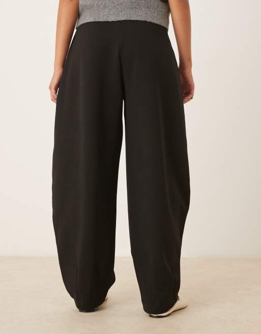 ASOS DESIGN horseshoe barrel leg interlock pants in black