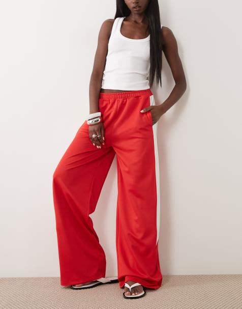 ASOS DESIGN – Hose aus Trikotstoff in Rot mit weitem Bein und Paspelierung - view 1