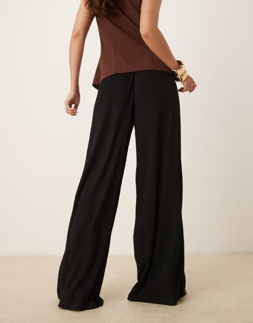 ASOS DESIGN – Hose in Schwarz mit Knitterstruktur, weitem Bein und Kordelzugbund, 5 von 5