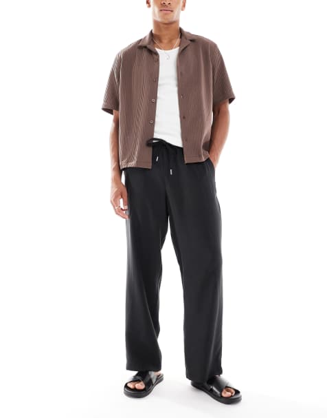 ASOS DESIGN – Hose in Schwarz mit weitem Bein und elastischem Bund - view 1