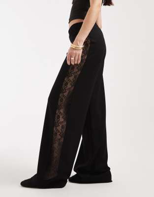 Hose in Schwarz mit weitem Bein und Spitzeneinsatz Schwarz S