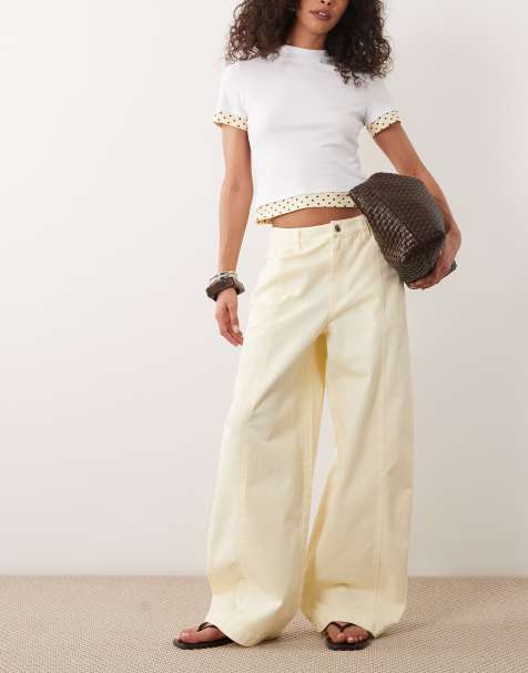 ASOS DESIGN – Hose in verwaschener Optik in Buttermilchgelb mit abgerundetem Beinschnitt - view 1