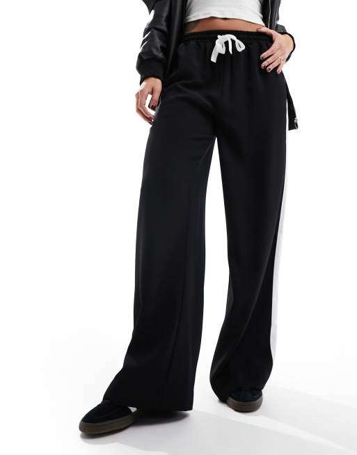 ASOS DESIGN – Hose zum Hineinschlüpfen mit Kontrastbahn in Schwarz, 4 von 5