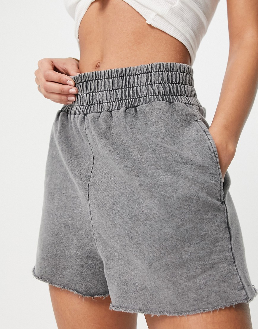 ASOS DESIGN hot pant with deep waistband and raw hem in acid wash in charcoal-Grey
