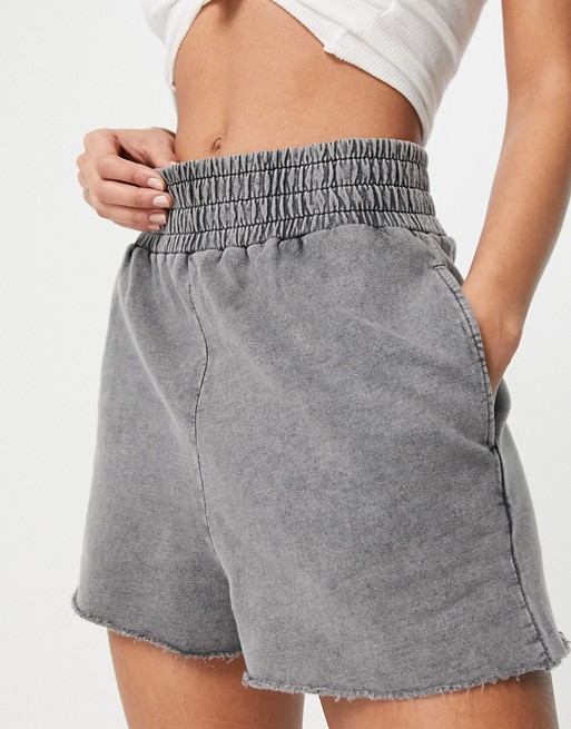 ASOS DESIGN hot pant with deep waistband and raw hem in acid wash in charcoal