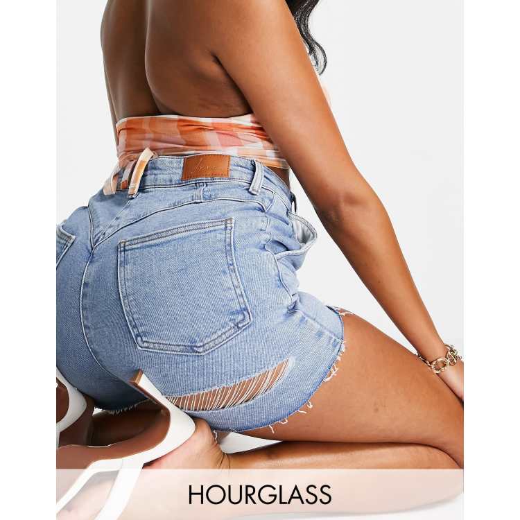 ASOS DESIGN Hourglass denim skinny short with bum rip in blue