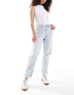 Hourglass high rise relaxed mom jeans in light blue with rip