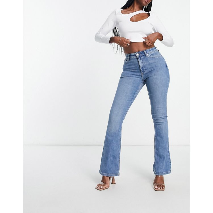 ASOS DESIGN Hourglass low rise stretch flare jeans with lace up in