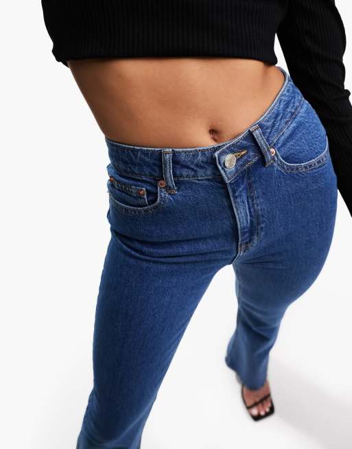 ASOS DESIGN Hourglass mid rise flare jeans in mid blue, 4 of 5
