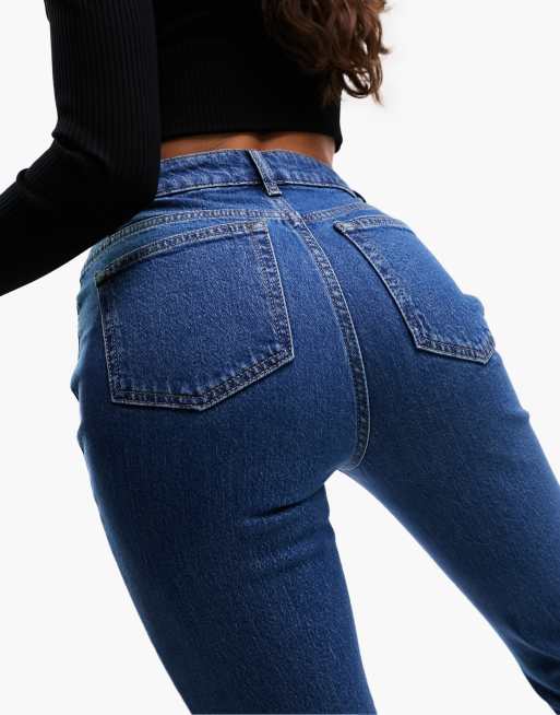 ASOS DESIGN Hourglass mid rise flare jeans in mid blue, 5 of 5