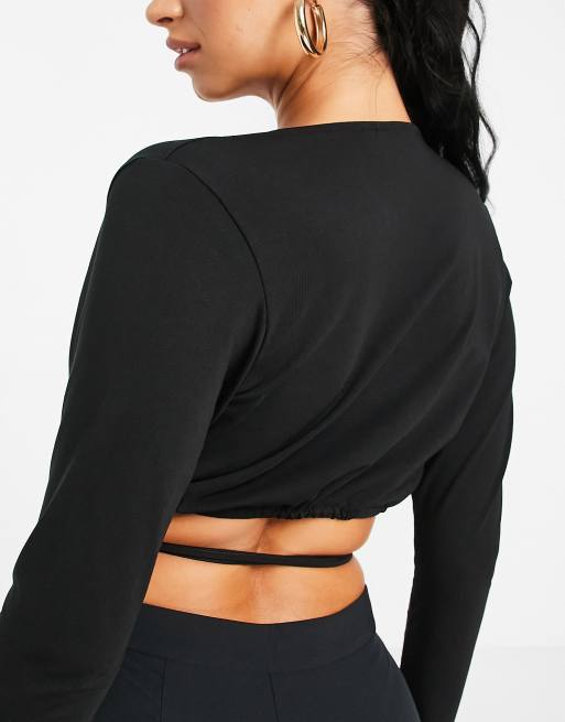 ASOS DESIGN - Crop top avec liens multiples à nouer - Blanc