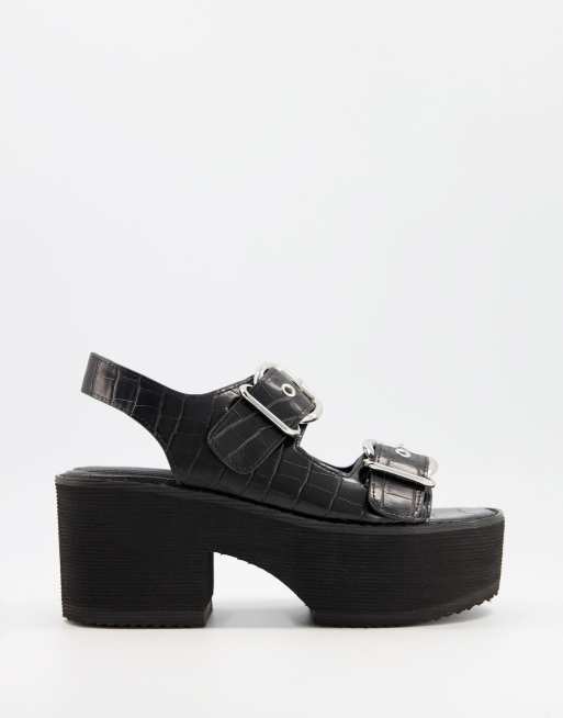 asos design storm chunky mid heeled loafers in black patent