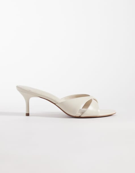 ASOS DESIGN Hum premium cross strap mid heeled mules in off white leather - view 1
