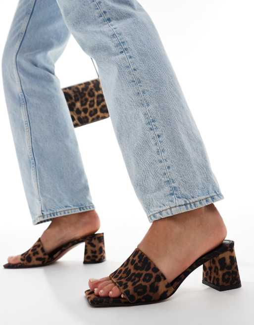 ASOS DESIGN Hundred mid block heeled mules in leopard 