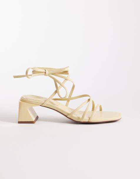 ASOS DESIGN Hundred strappy block heel sandals in butter yellow - view 1