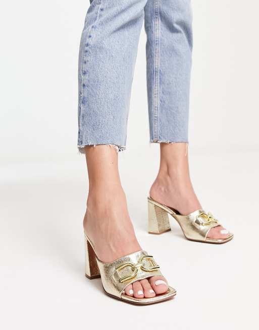 ASOS DESIGN Hitched bow detail mid block heeled sandals in gold