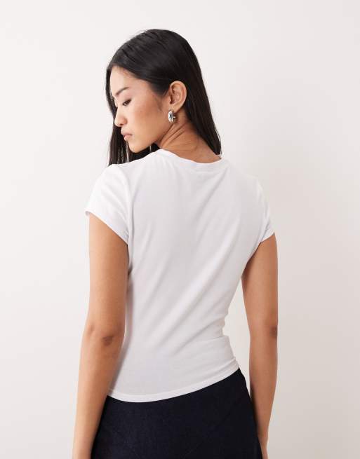 ASOS DESIGN - Hvid baby-T-shirt med 'Lisbon'-postkortgrafik, 4 af 4