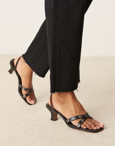 ASOS DESIGN – Hyatt – Czarne klapki na średnim obcasie ze wzorem skóry węża z oczkami - view 1