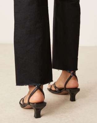 Asos Design Hyatt Eyelet Detail Mid Heeled Mules In Black